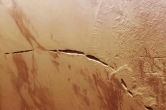 Шрам Марса: гигантское ущелье у подножия вулкана на фото