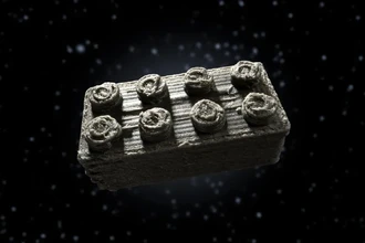 Кубики из метеоритной пыли: как LEGO и ESA создают стройматериалы для Луны